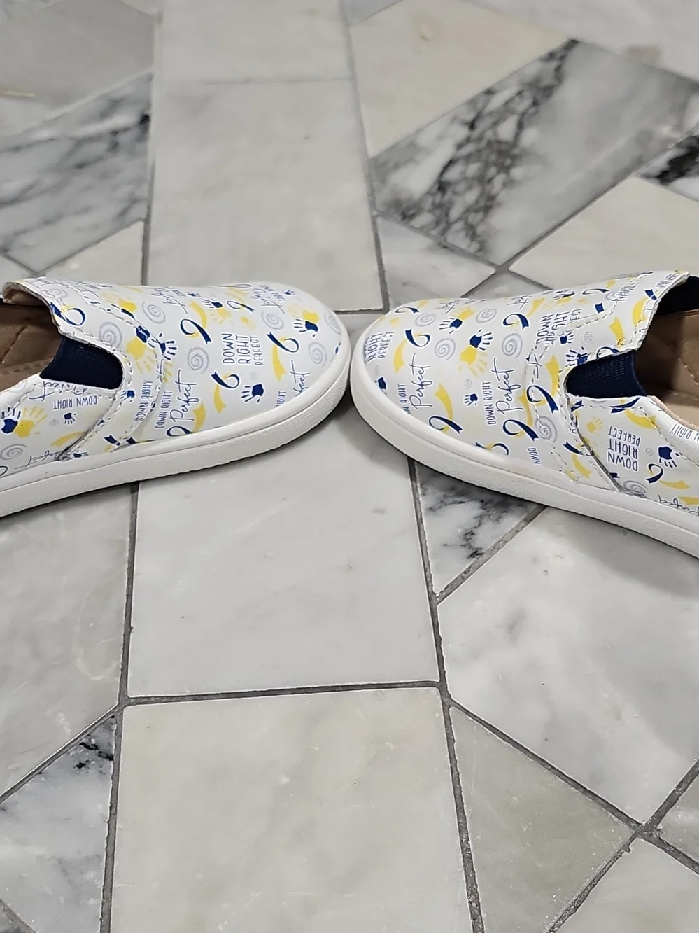 Monkey Feet White Slip-On Sneakers with Blue & Yellow Prints 12-18 Months